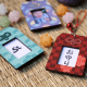 Omamori képkeret bross